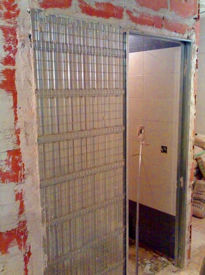 Instalación de puerta corredera y trabajos de albañilería y pintura Instalación de puerta corredera y trabajos de albañilería y pintura