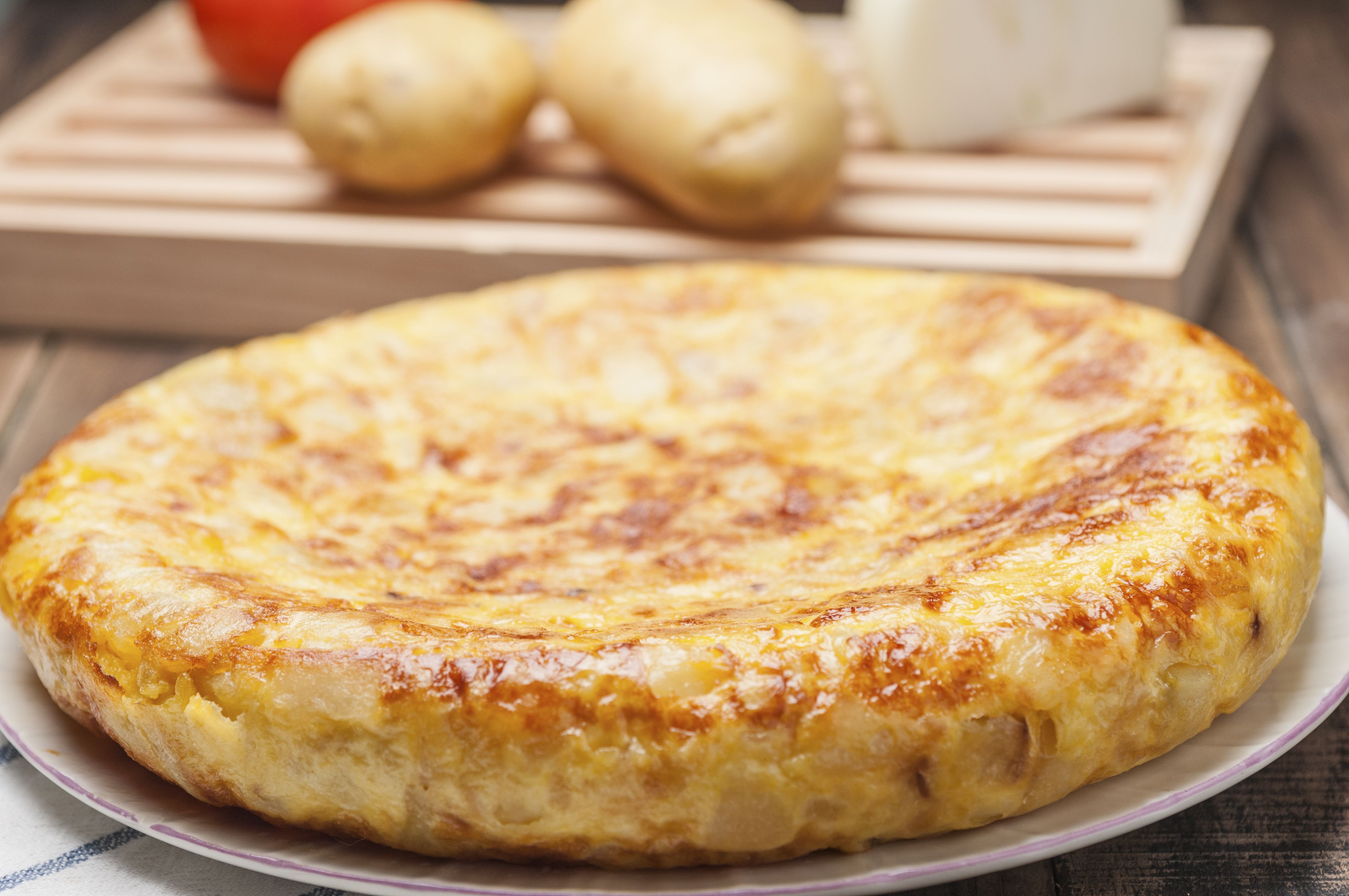 Tortilla de patata con cebolla: Nuestros productos de Precocinados Mi Tierra Tortilla de patata con cebolla: Nuestros productos de Precocinados Mi Tierra