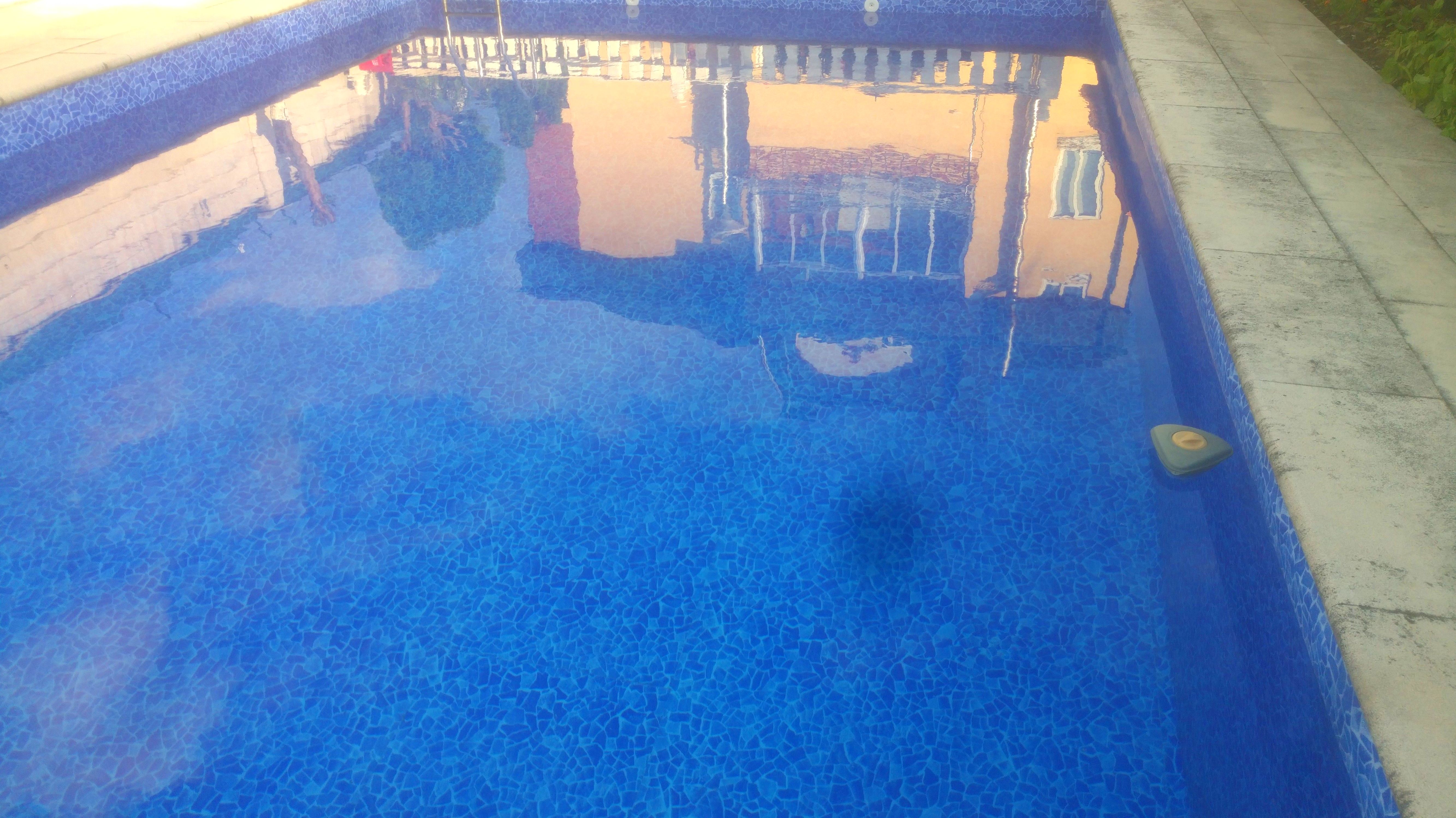 Piscina privada con pvc acabado en piedra azul Piscina privada con pvc acabado en piedra azul