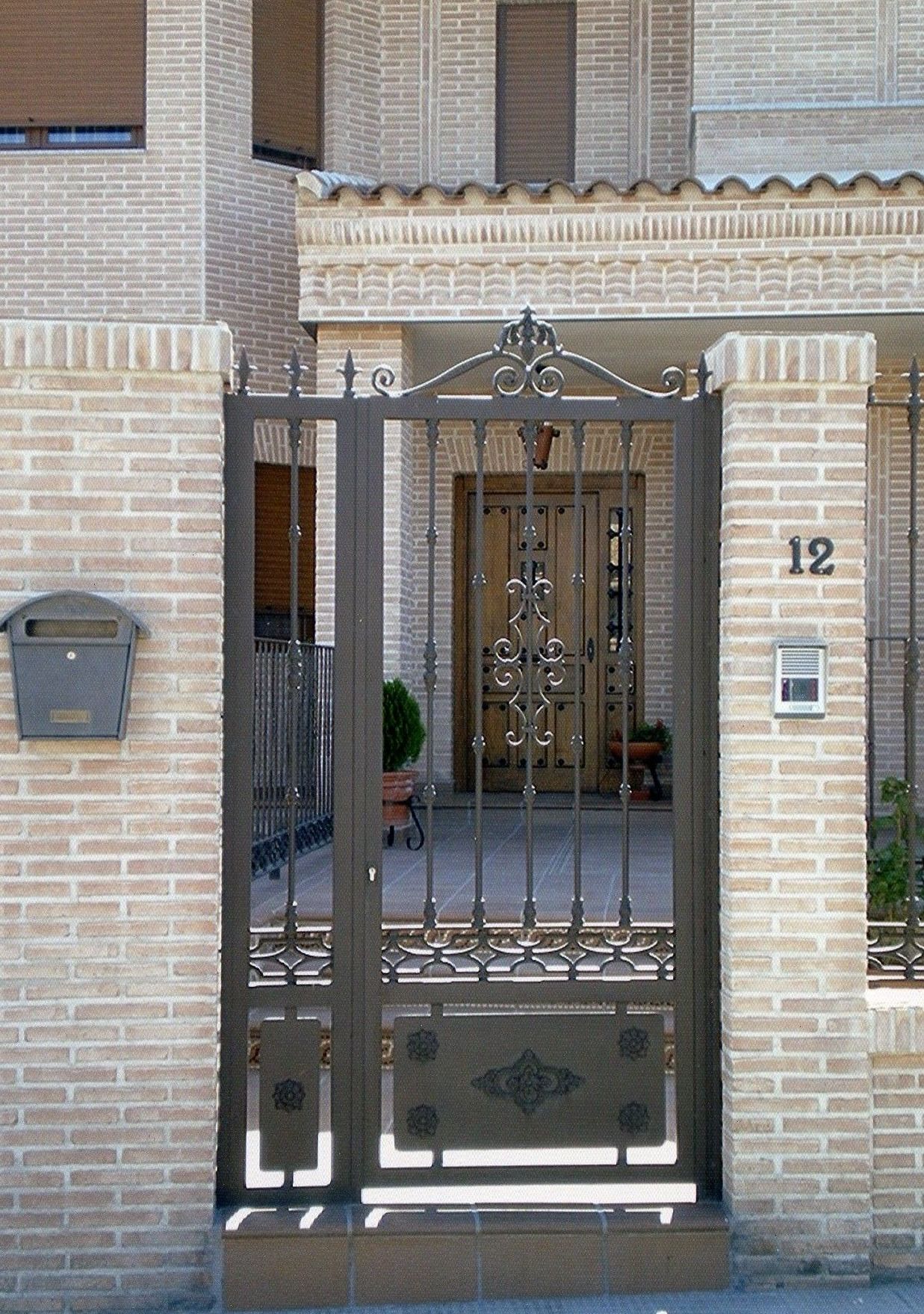 Puerta de forja con fijo Puerta de forja con fijo