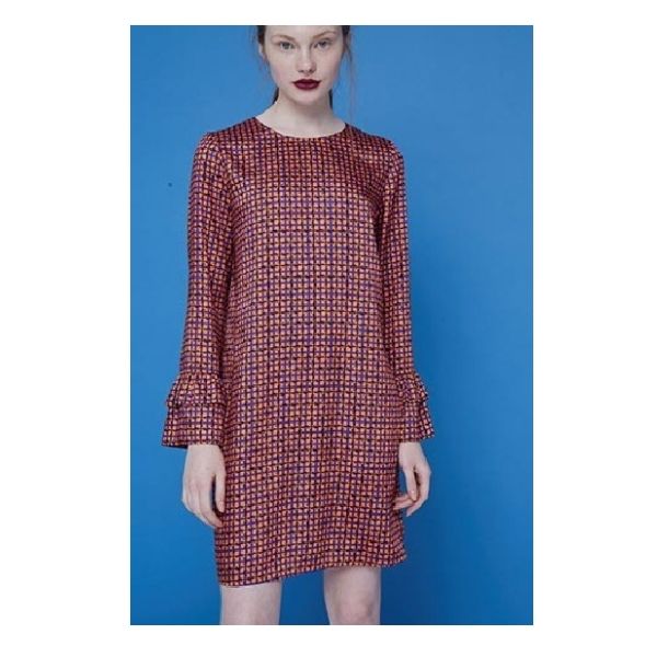 Vestido naranja estampado doble volante en puño. Dolores Promesas Vestido naranja estampado doble volante en puño. Dolores Promesas