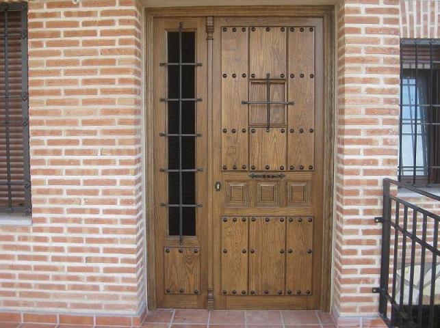 Puertas exteriores: CATÁLOGO de CARPINTERÍA Y EBANISTERÍA ARCAMADE Puertas exteriores: CATÁLOGO de CARPINTERÍA Y EBANISTERÍA ARCAMADE