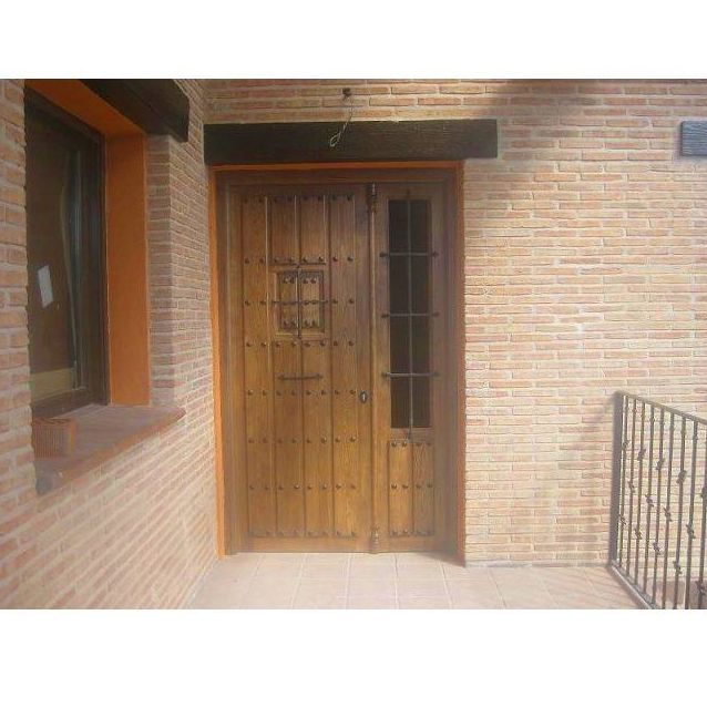 Puertas exteriores: CATÁLOGO de CARPINTERÍA Y EBANISTERÍA ARCAMADE Puertas exteriores: CATÁLOGO de CARPINTERÍA Y EBANISTERÍA ARCAMADE