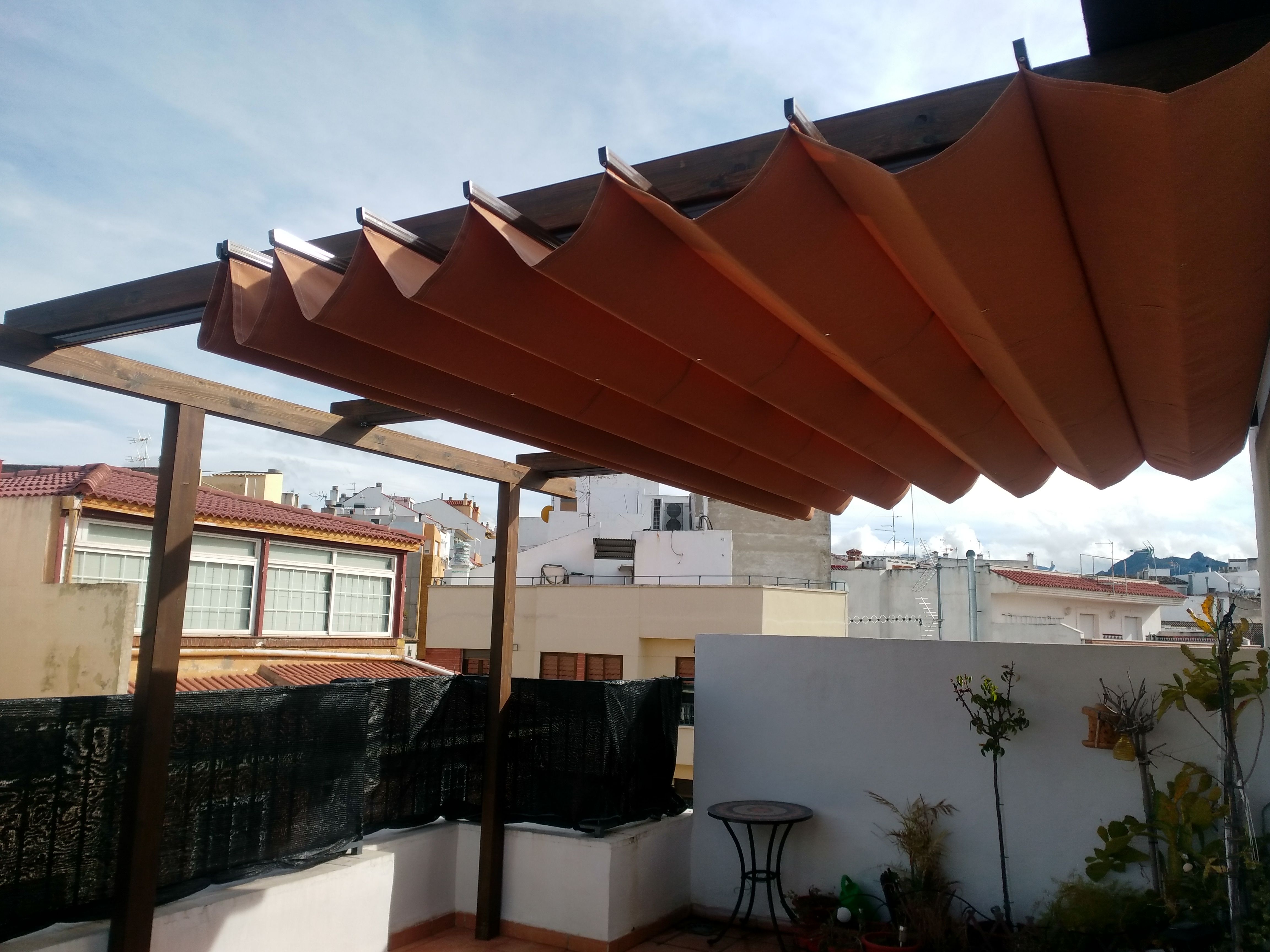 Pérgolas con toldo: Productos y materiales de Toca Madera Pérgolas con toldo: Productos y materiales de Toca Madera