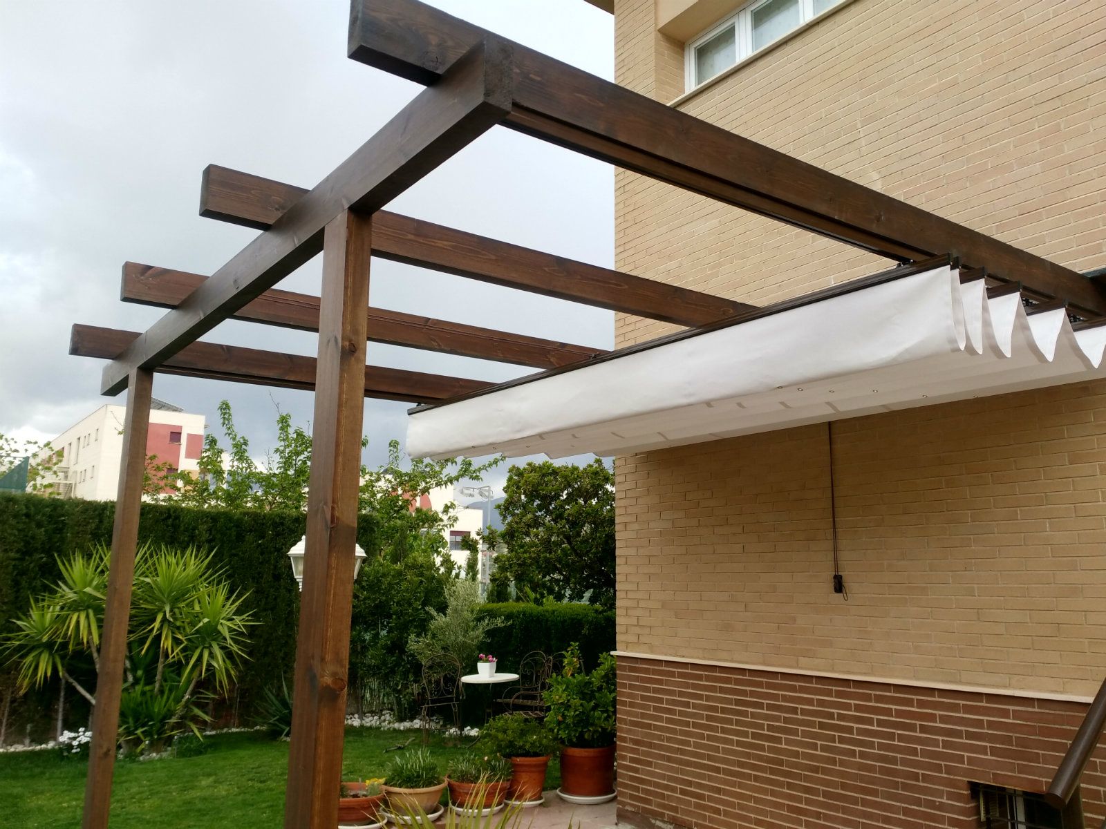 Pérgolas con toldo: Productos y materiales de Toca Madera Pérgolas con toldo: Productos y materiales de Toca Madera