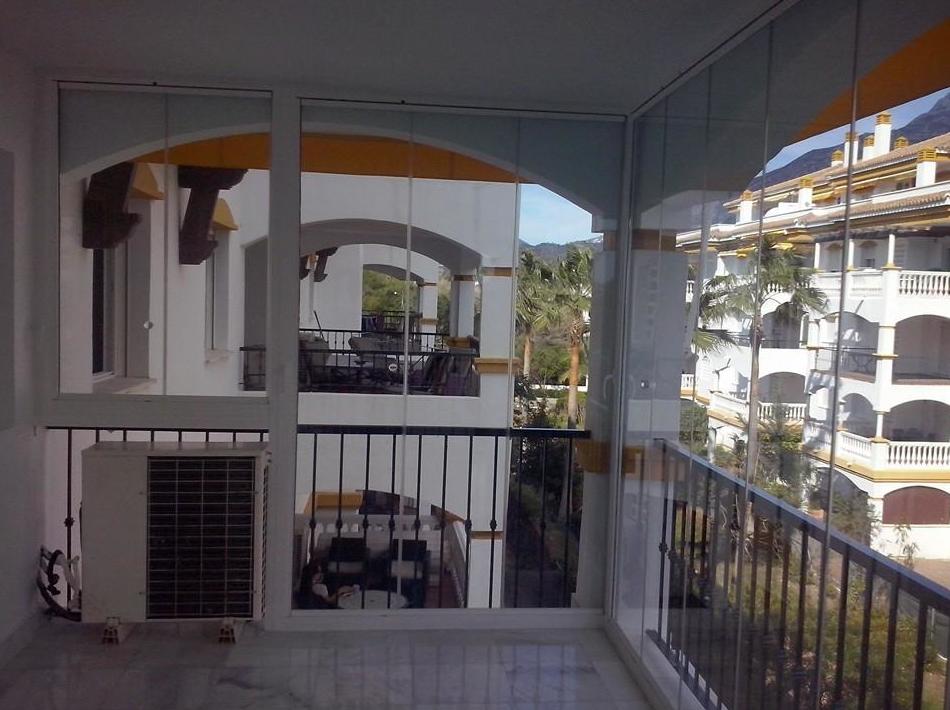 Cortinas de cristal en terrazas: Trabajos de NeoGlass Cortinas de cristal en terrazas: Trabajos de NeoGlass