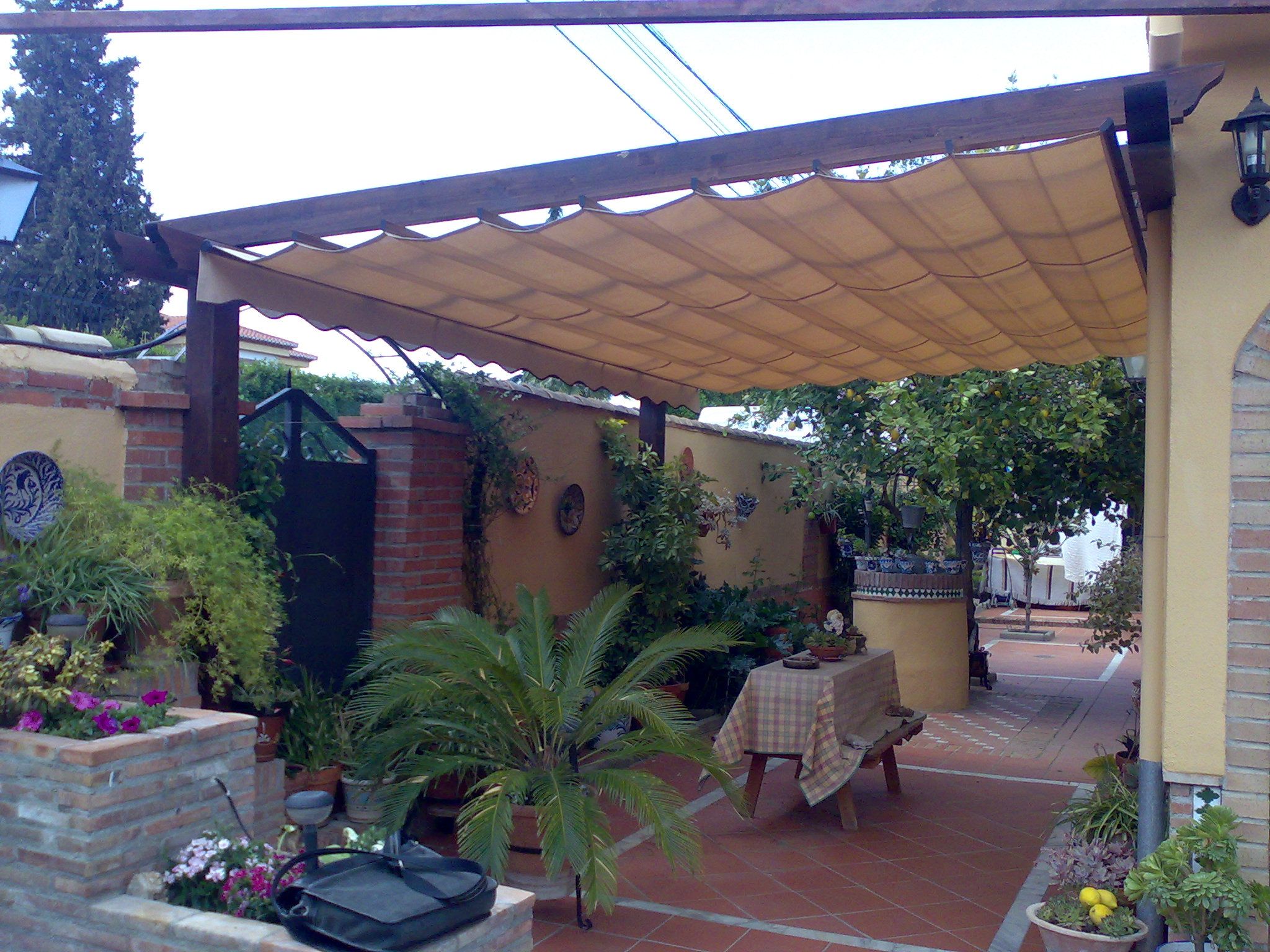 Toldo plano con guías: Productos de Toldos Guadalgenil Toldo plano con guías: Productos de Toldos Guadalgenil