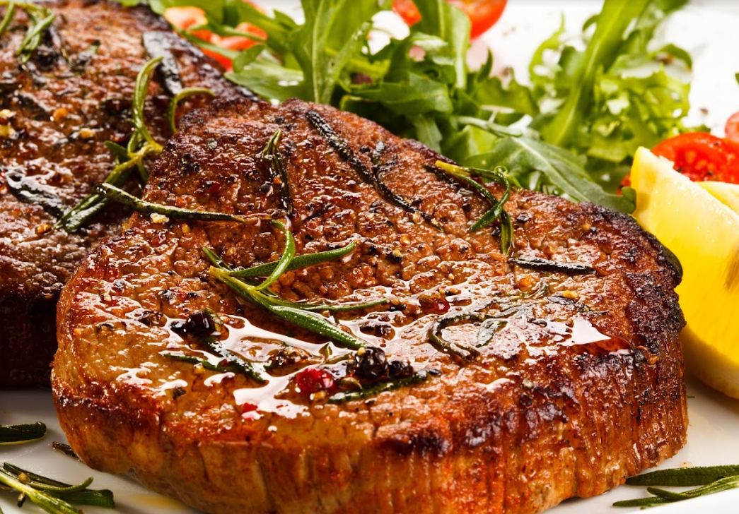 Carnes al horno de leña: Catálogo de Restaurante El Puerto Carnes al horno de leña: Catálogo de Restaurante El Puerto