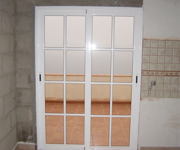 Puerta de aluminio correderas