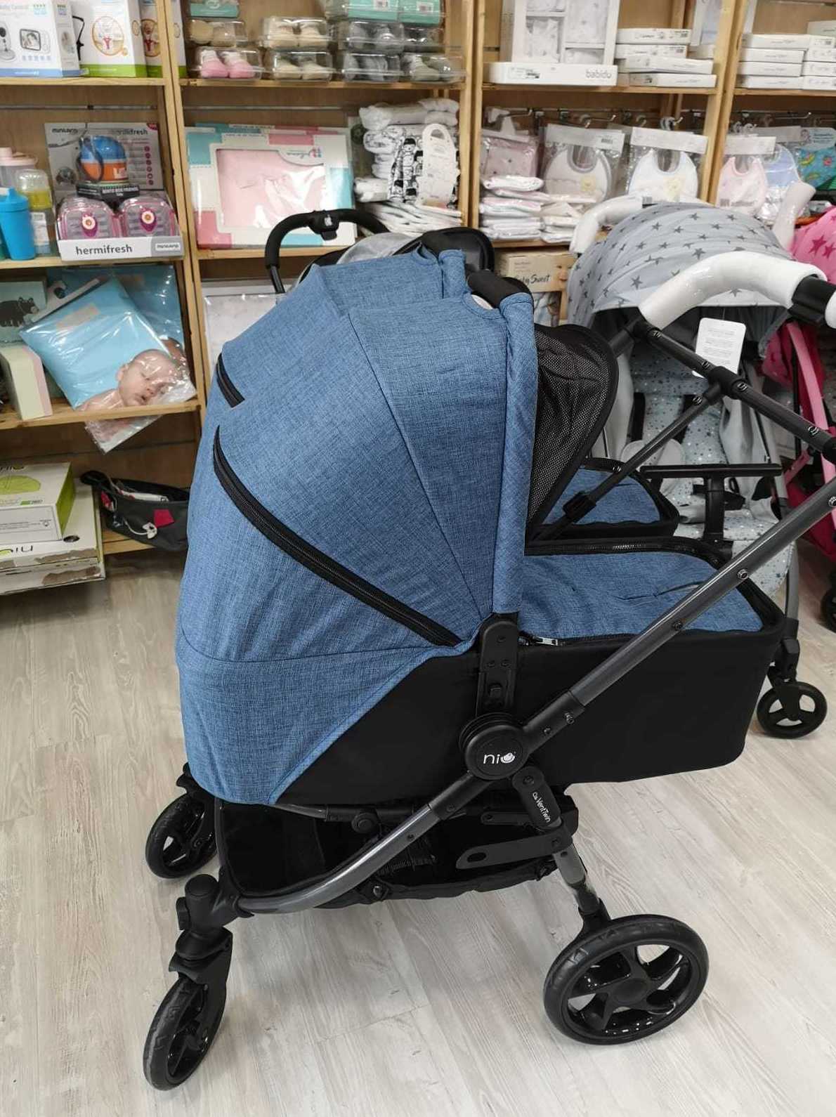Silla gemelar Vent de NIU: Catálogo de Paula de la Flor Silla gemelar Vent de NIU: Catálogo de Paula de la Flor
