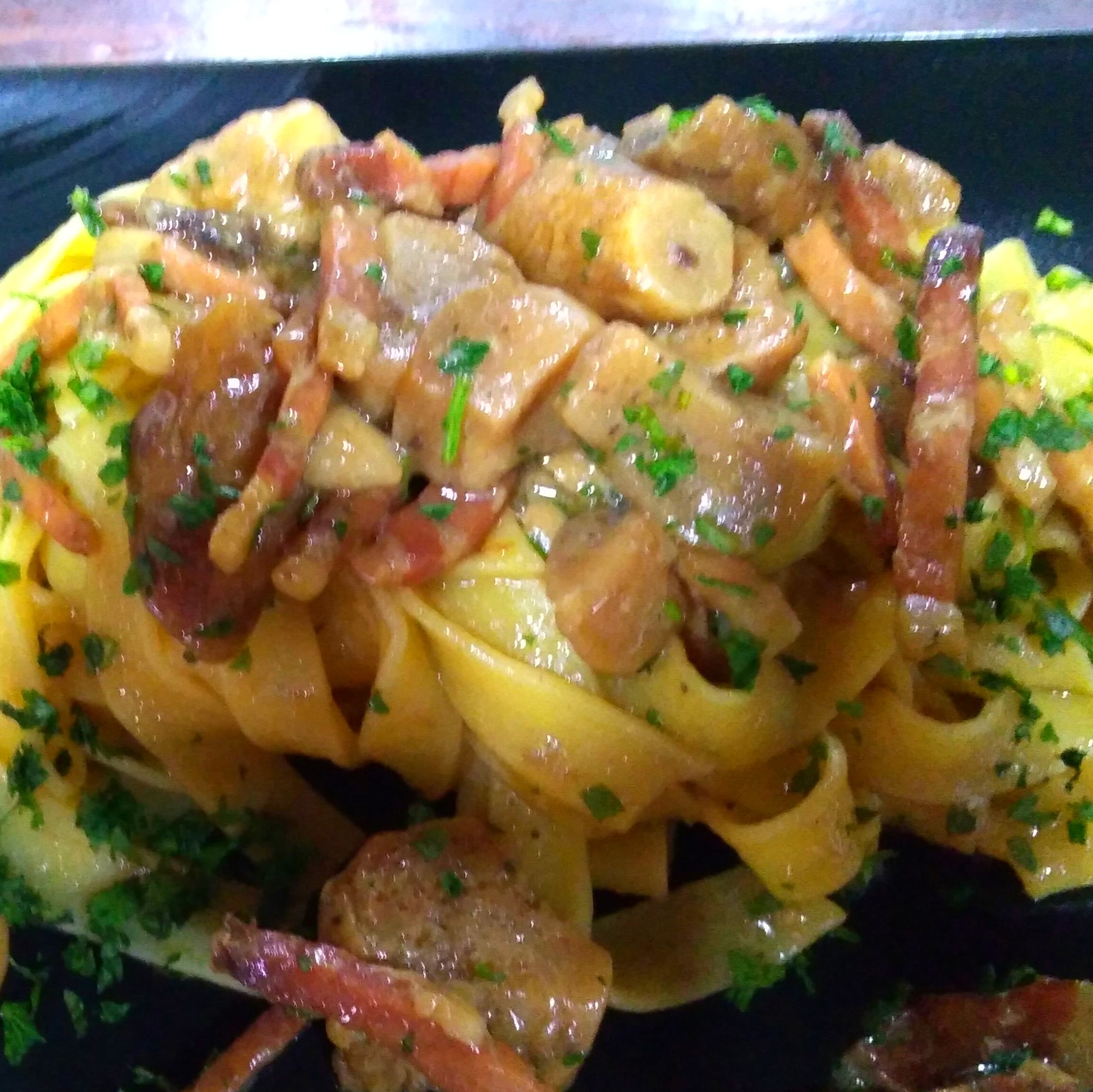 Tagliatelle speck e porcini Tagliatelle speck e porcini