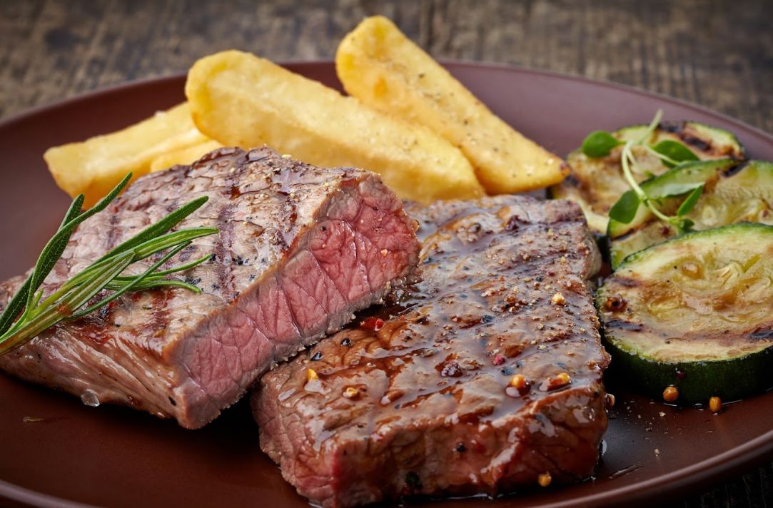 Carnes en la lumbre: Especialidades de Asador La Bolera Carnes en la lumbre: Especialidades de Asador La Bolera