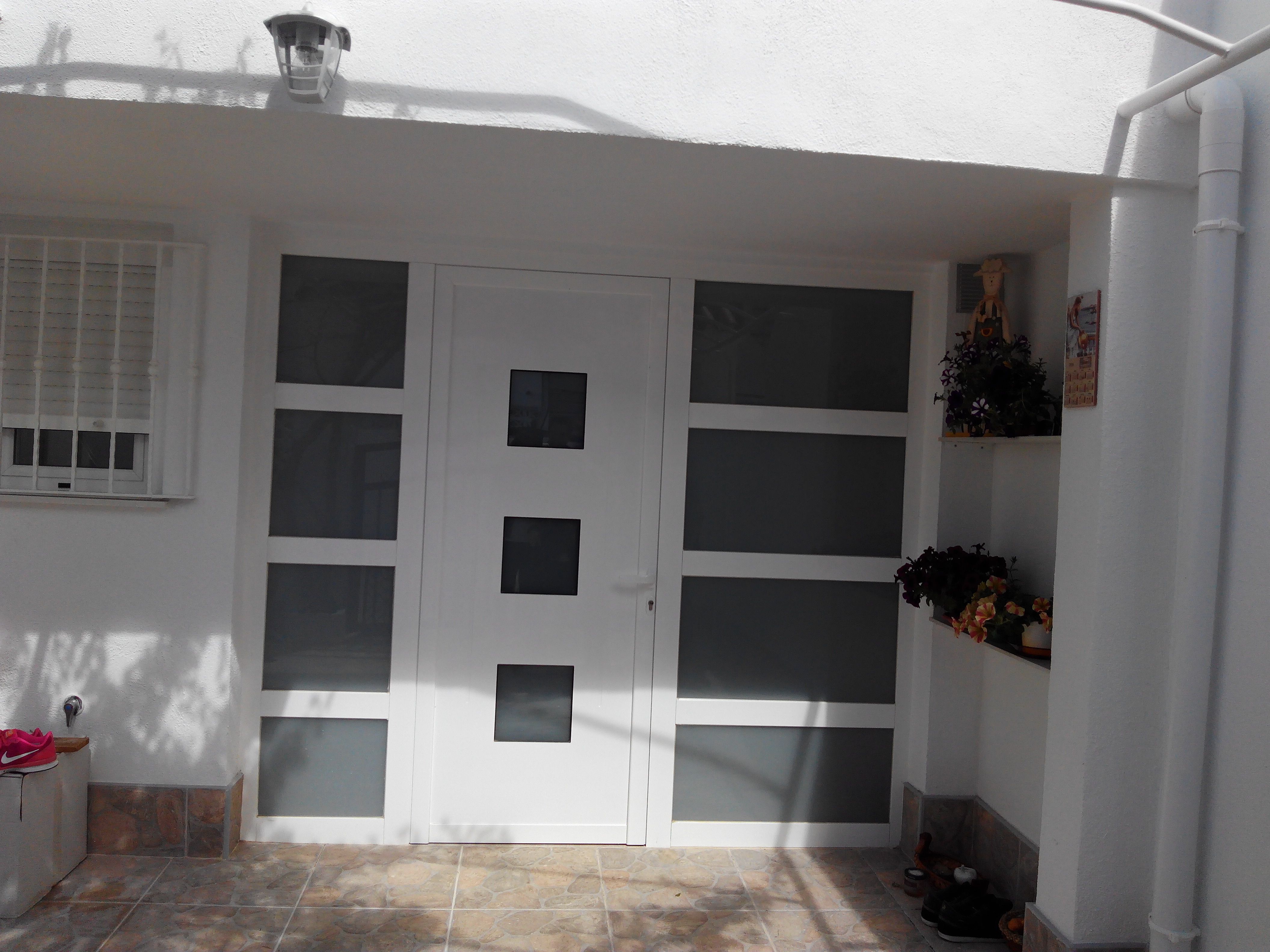 Puertas de exterior: Carpintería de aluminio de Laborda Tecnología del Aluminio, S.L. Puertas de exterior: Carpintería de aluminio de Laborda Tecnología del Aluminio, S.L.