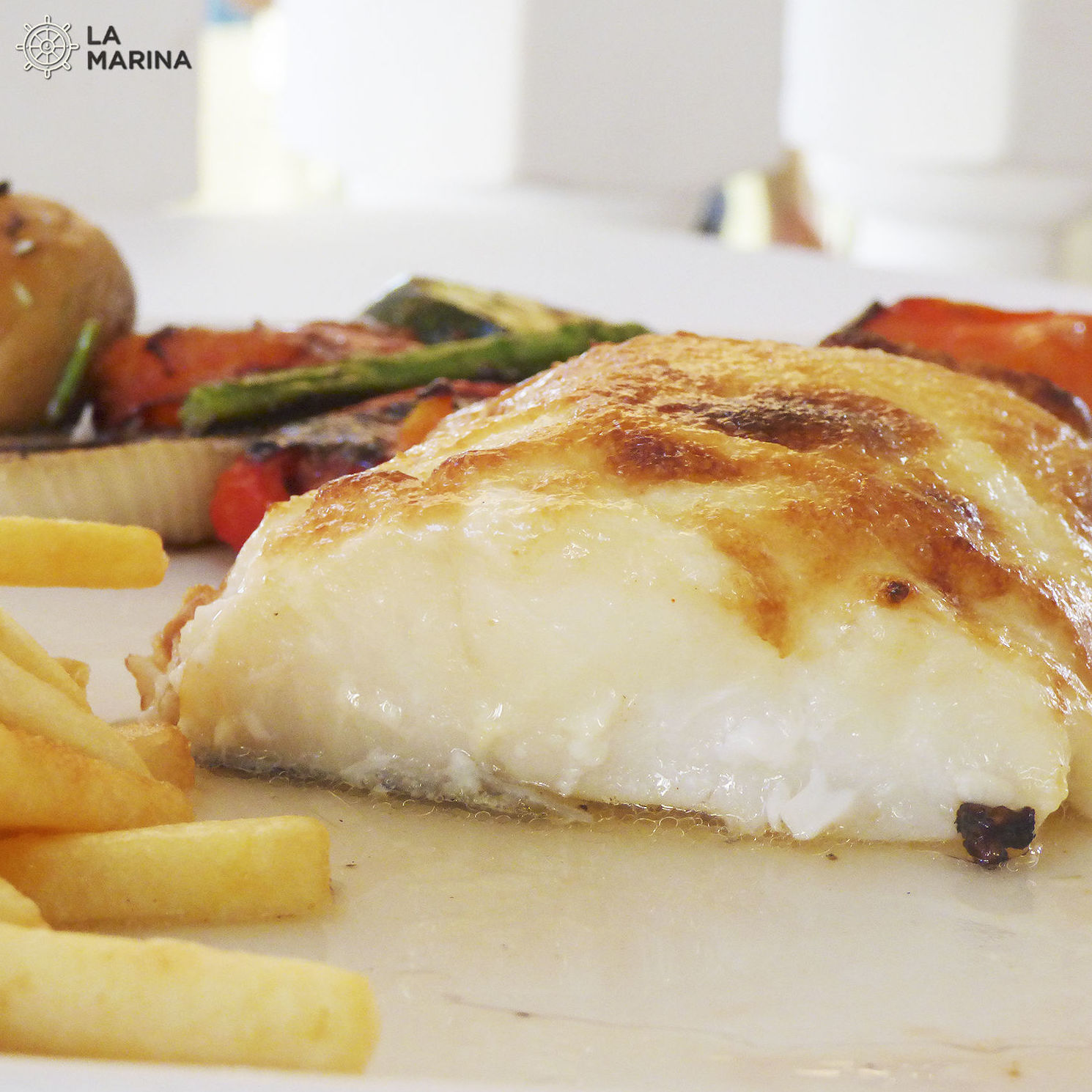Bacalao horneado con muselina de ajo Bacalao horneado con muselina de ajo