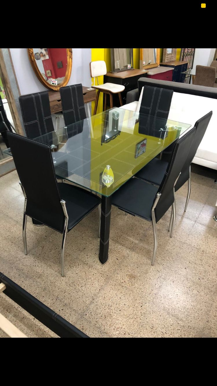 Mesa cristal y 6 sillas negras: Productos de Remar Castellón Mesa cristal y 6 sillas negras: Productos de Remar Castellón
