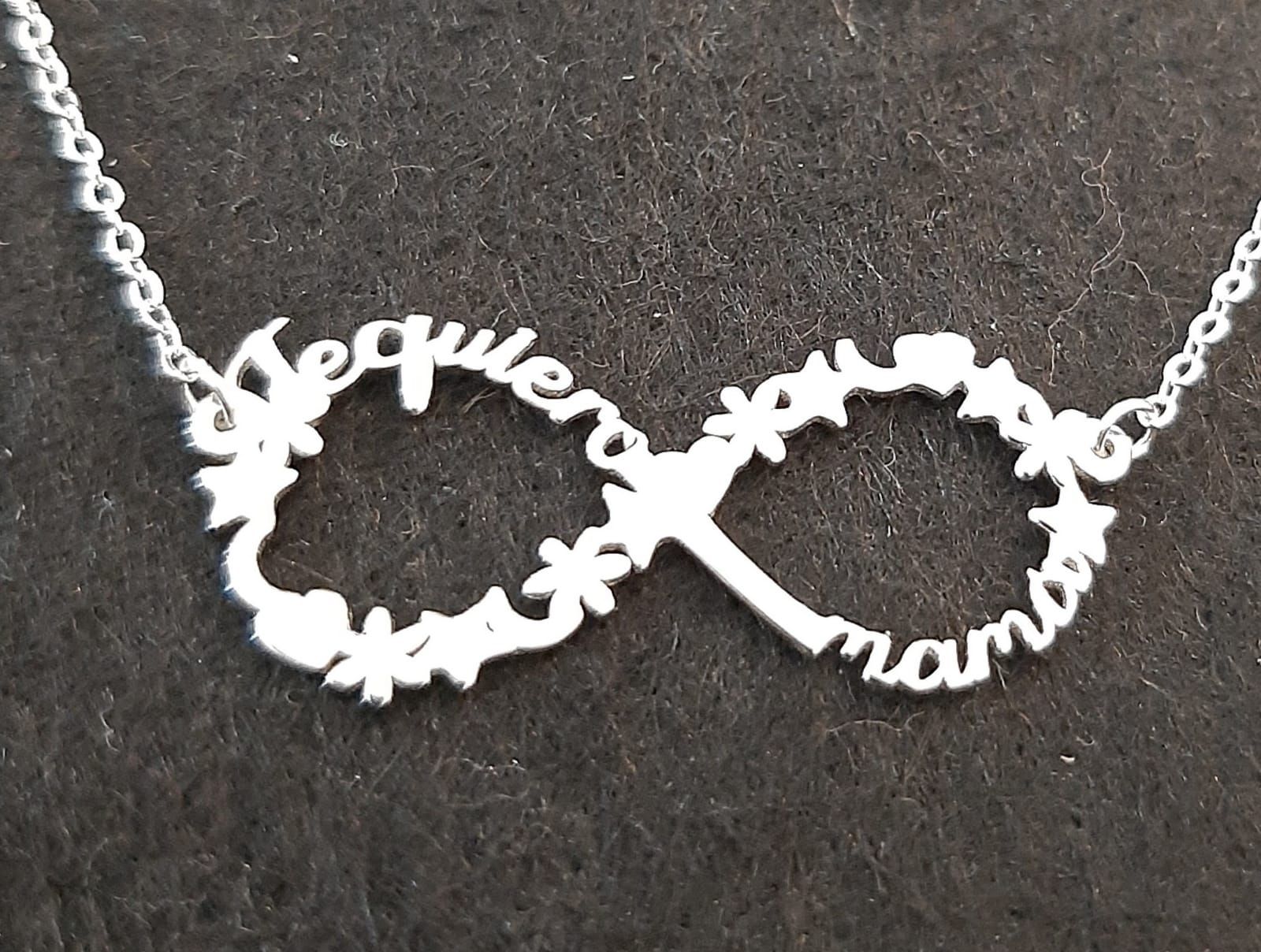 Colgante en plata de ley con mamá calado y cadena con circonitas: Catálogo de Joyería Izquierdo Colgante en plata de ley con mamá calado y cadena con circonitas: Catálogo de Joyería Izquierdo