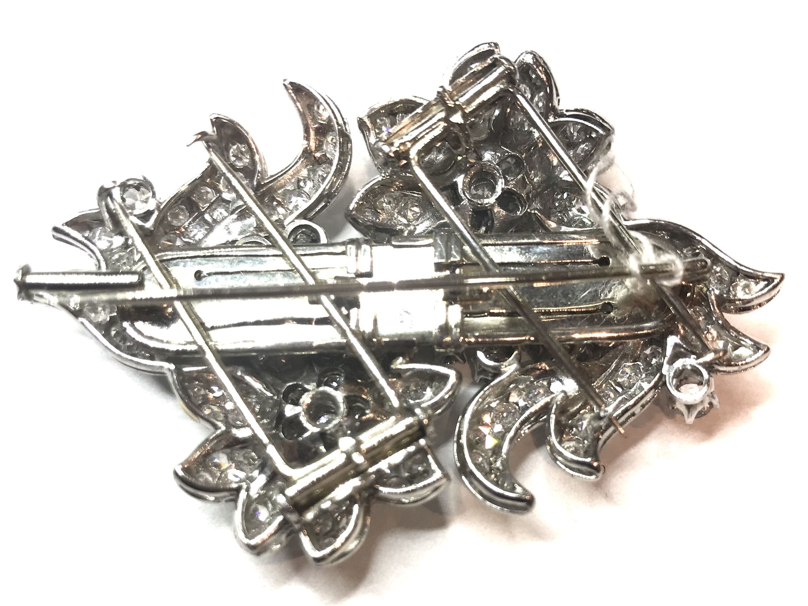 Broche doble clip floral de brillantes y platino. Ref. A-13969: Catálogo de Antigua Joyeros Broche doble clip floral de brillantes y platino. Ref. A-13969: Catálogo de Antigua Joyeros