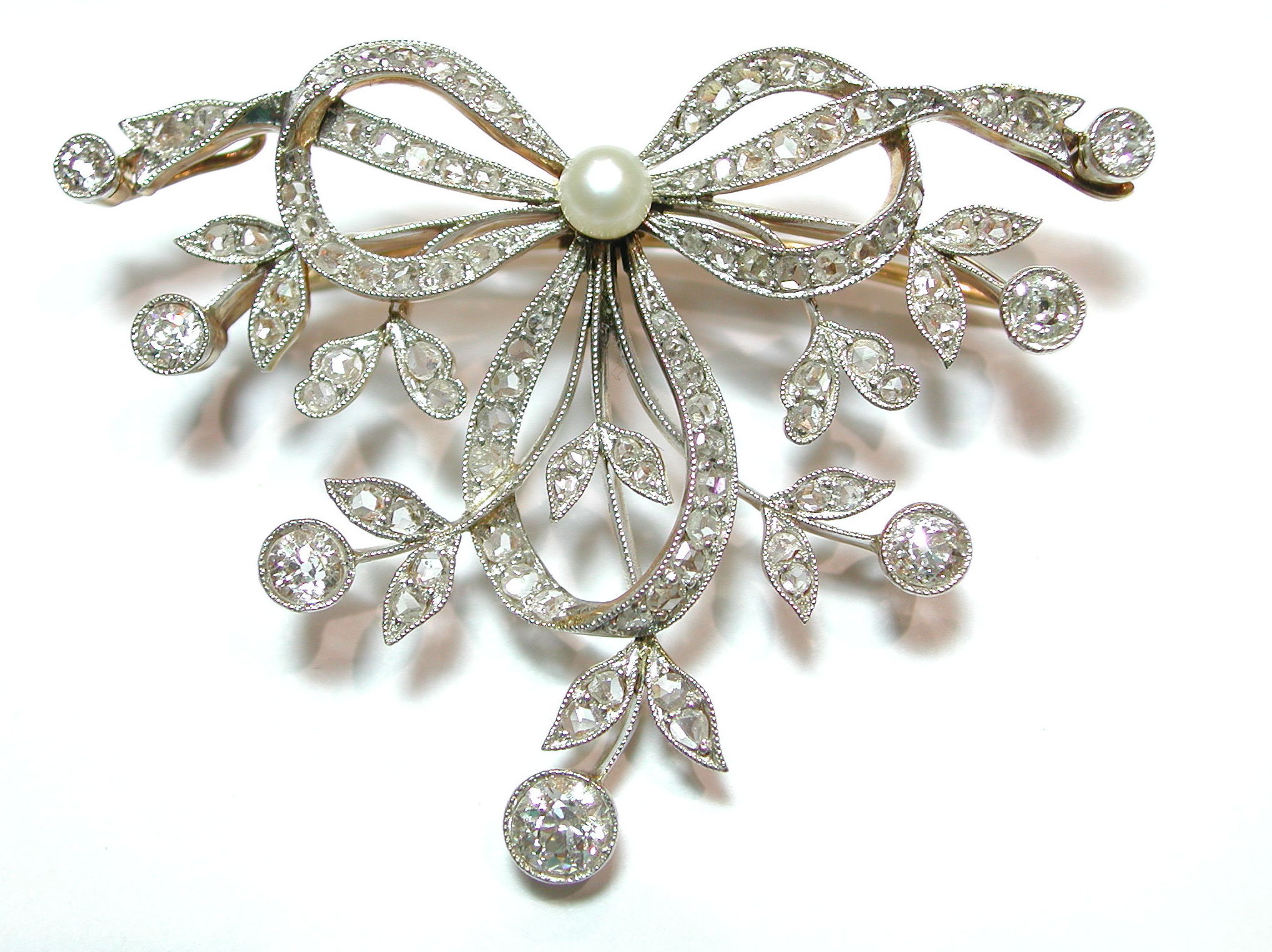 Broche- Pendentif con motivos vegetales. Circa: 1910.: Catálogo de Antigua Joyeros Broche- Pendentif con motivos vegetales. Circa: 1910.: Catálogo de Antigua Joyeros