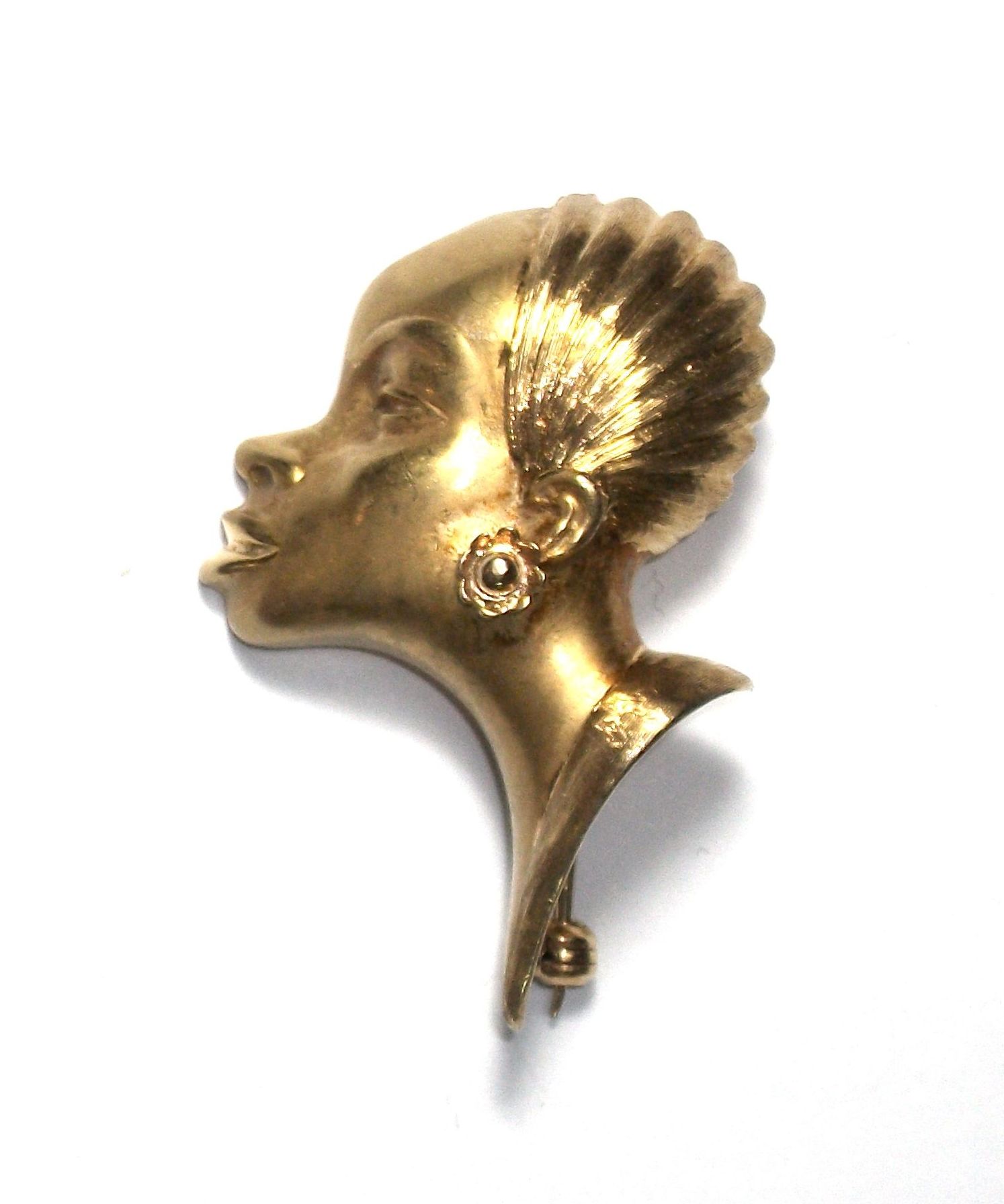 Broche con rostro femenino en oro de 18k. S. XX.: Catálogo de Antigua Joyeros Broche con rostro femenino en oro de 18k. S. XX.: Catálogo de Antigua Joyeros
