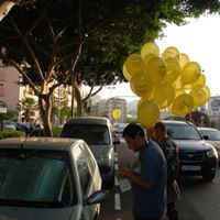 Publicidad de apertura de local comercial con globos