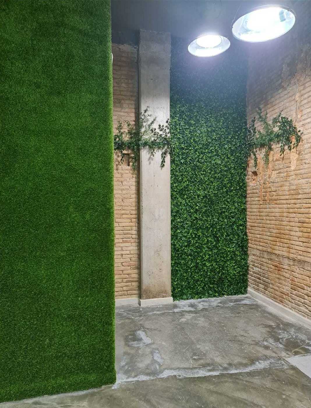 Decoración en local comercial, plantas, césped artificial para Cosmeticos Valencia.