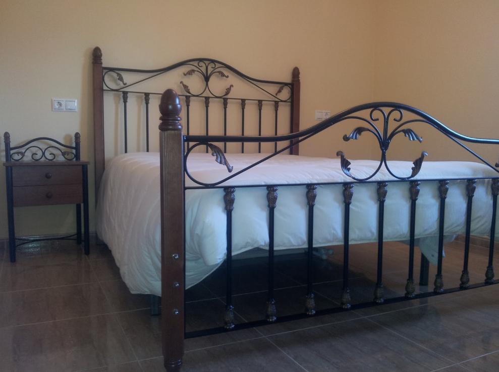 Cama Bélgica con madera: Catálogo de muebles de forja de Forja Manuel Jiménez Cama Bélgica con madera: Catálogo de muebles de forja de Forja Manuel Jiménez