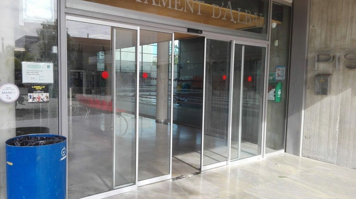 Puerta de cristal corredizas automáticas sistema de evacuación